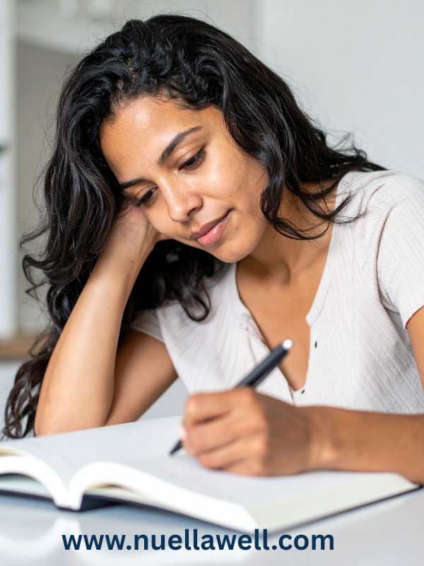 image-of-a mom-journaling-for-everyday-wellness-guide-for-busy-moms