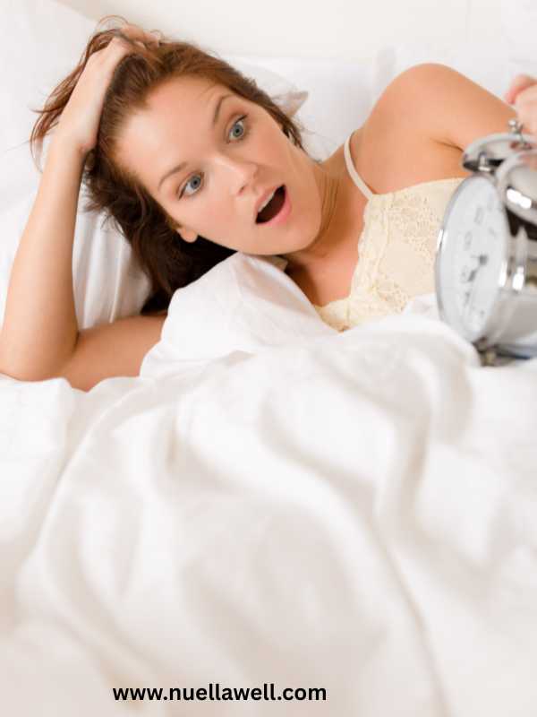 a-mom-waking-up-at-the-sound-of-an-alarm-clock