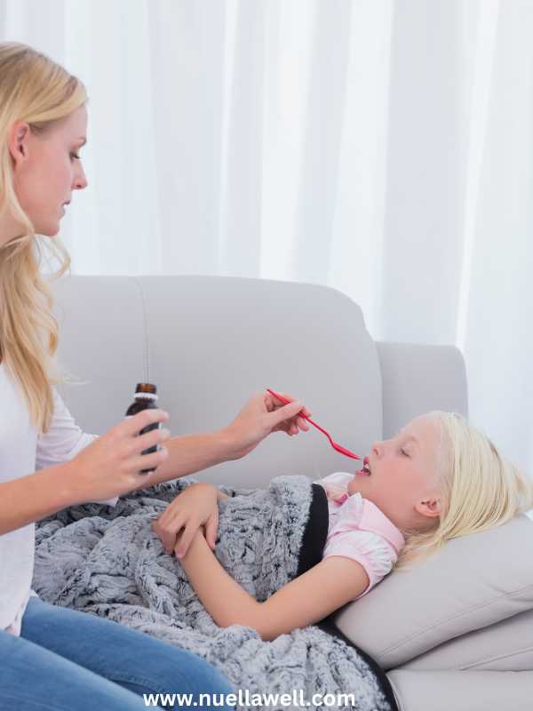 A-mom-giving-medicine-to-her-child-in-common-medication-mistakes-moms-make