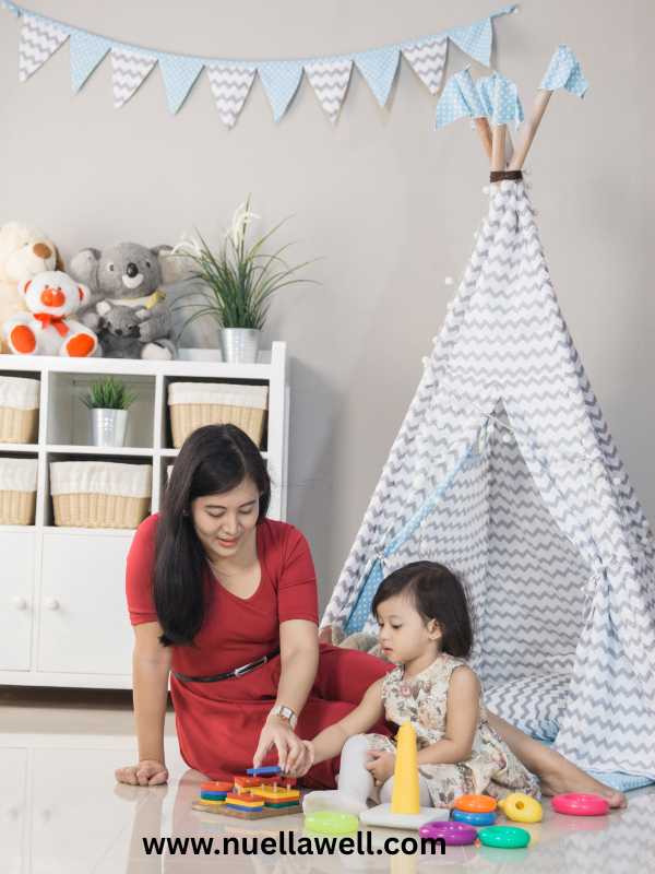 a-mom-guiding-her-kids-on-arranging-her-toys