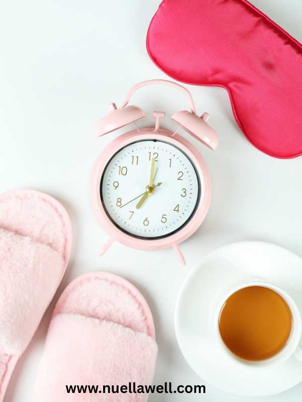 a-pink-foot and eye-wear-and-alarmclock-for-night-routine-in-how-busy-moms-can-improve-sleep-naturally