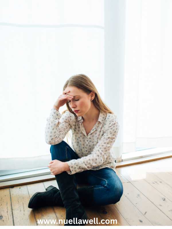 an-overwhelmed-and-stressed-busy-mom-thinking-on-how-to-set-and-achieve-realistic-goals