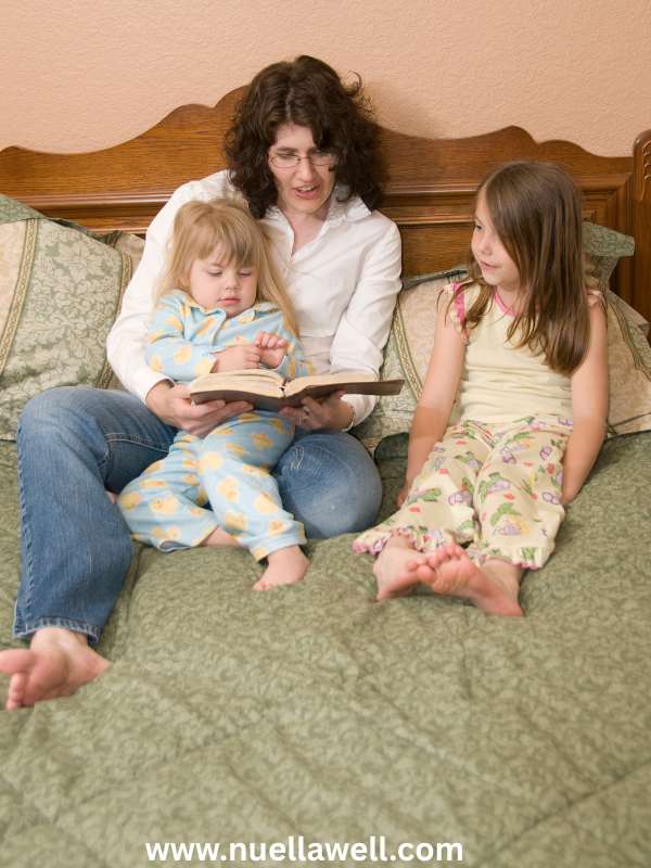 Mom-helping-her-children-establish-a-healthy-bedtime-routine-in-how-to-reset-your-child's-sleep-schedule-before-school-starts
