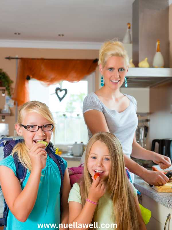 mom-and-her-kids-preparing-breakfast-in-easy-summer-routine-for-busy-moms-and-kids