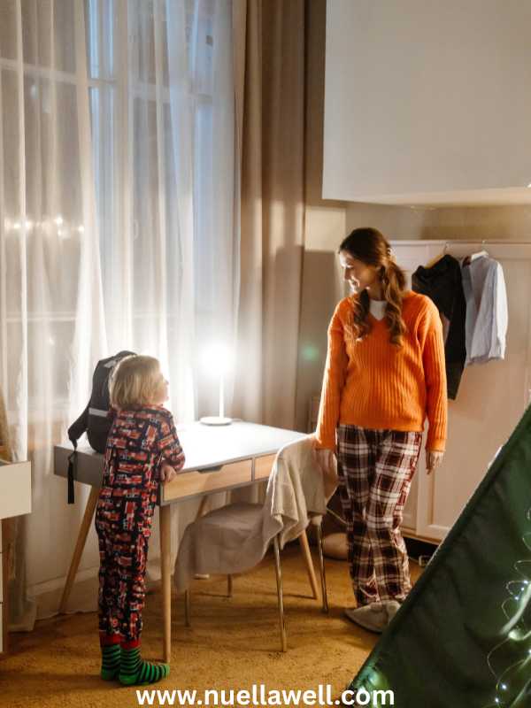 a-mom-helping-her-child-follow-a-morning-routine-before-school-to-make-school-mornings-less-stressful