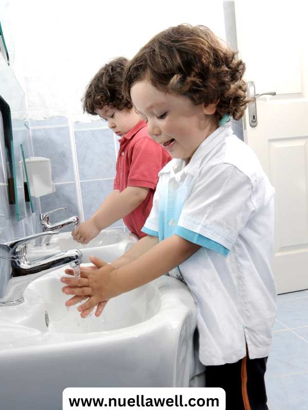 children-washing-their-hands-as-part-of-their-routine
