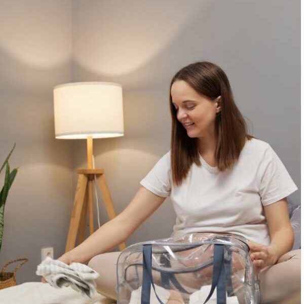 Mom-organizing-postpartum-supplies-in-postpartum-home-preparation-checklist