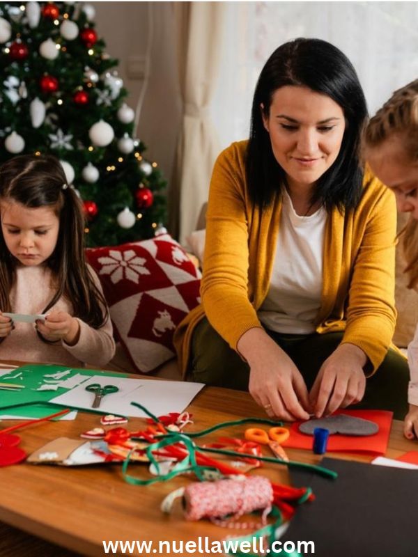 mother-and-children-making-simple-paper-christmas-decorations-at-home