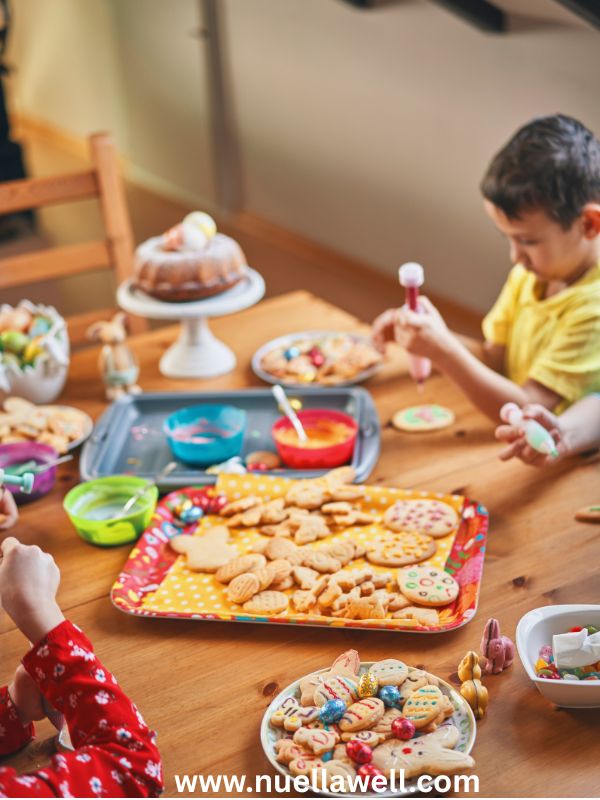 plain-cookies-icing-and-decorating-supplies-prepared-for-a-children's-Thanksgiving-kitchen-activity
